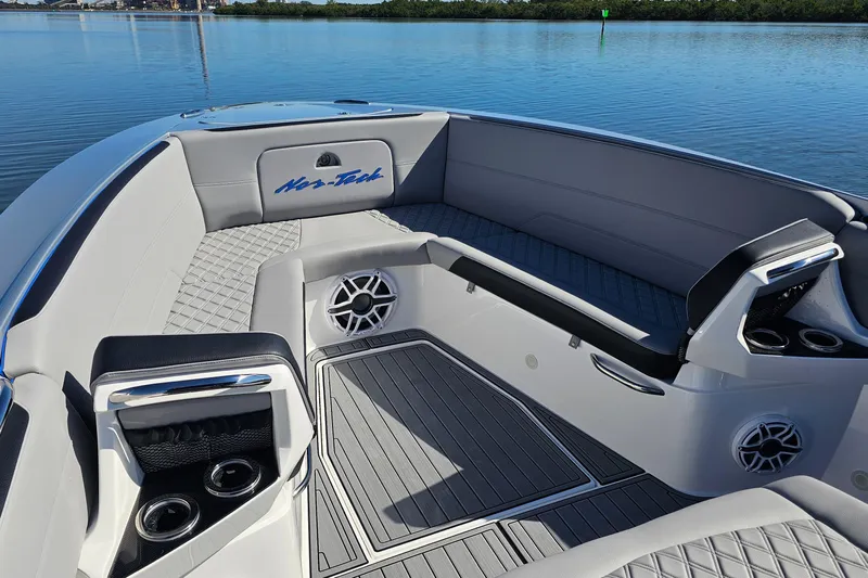  Yacht Photos Pics 2025 Nor-Tech 390 Sport Center Console boat interior with sleek seating and cup holders.