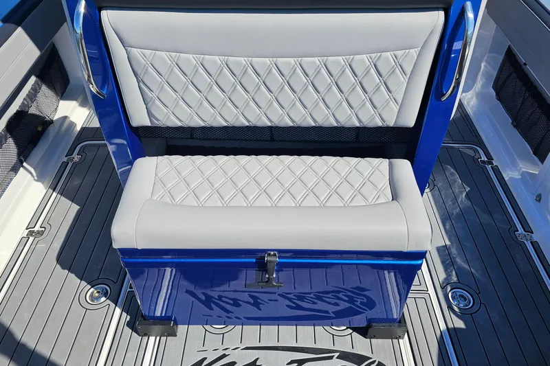  Yacht Photos Pics 2025 Nor-Tech 390 Sport Center Console, featuring diamond-stitched seating and sleek blue accents.