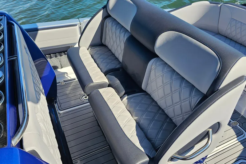  Yacht Photos Pics 2025 Nor-Tech 390 Sport Center Console boat with luxurious seating and quilted upholstery.