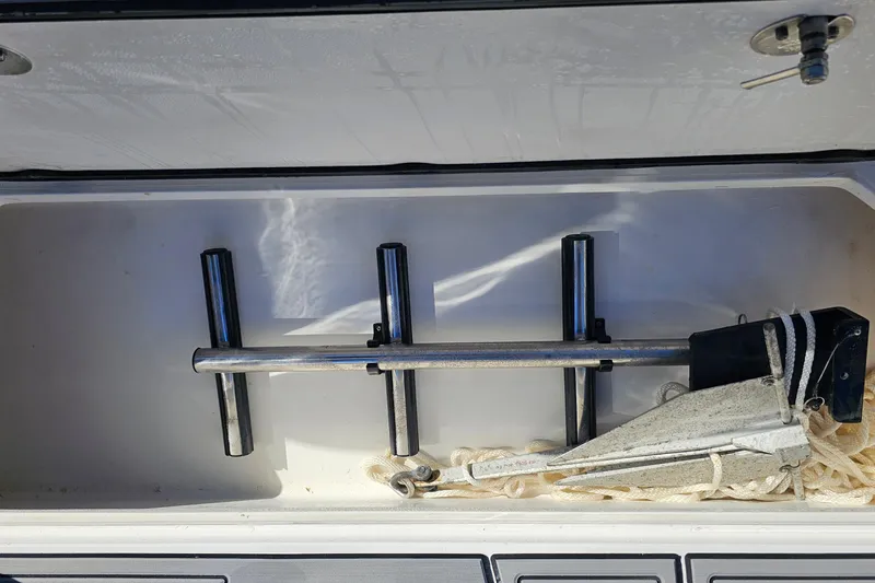 Yacht Photos Pics Storage compartment with anchor and rod holders on 2025 Nor-Tech 390 Sport Center Console.