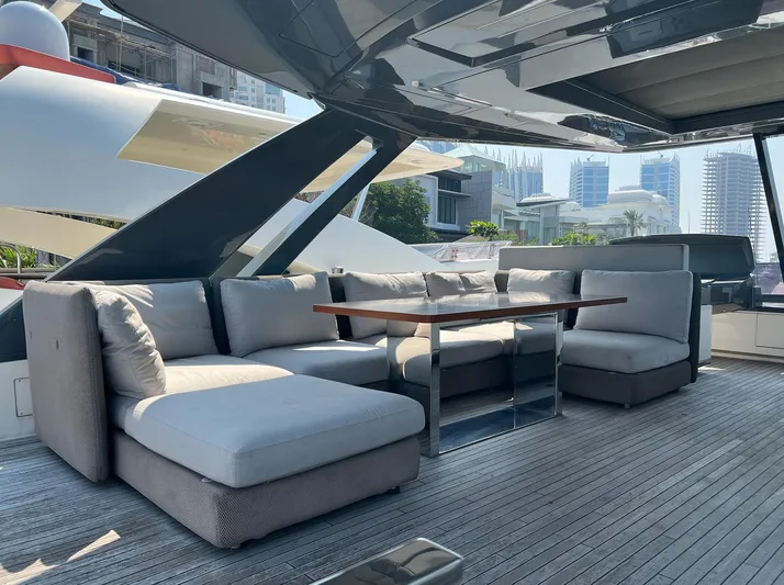  Yacht Photos Pics Luxurious outdoor seating on 2018 Ferretti Yachts 780, featuring plush cushions and sleek design.