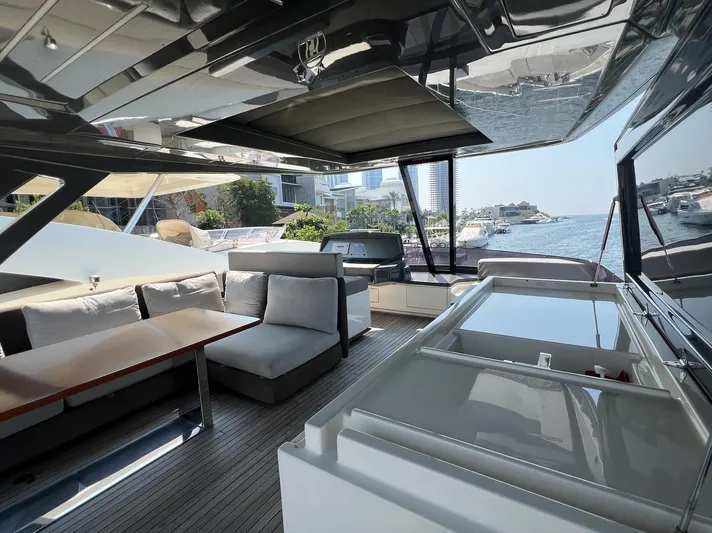  Yacht Photos Pics Luxurious 2018 Ferretti Yachts 780 interior with elegant seating and waterfront view.