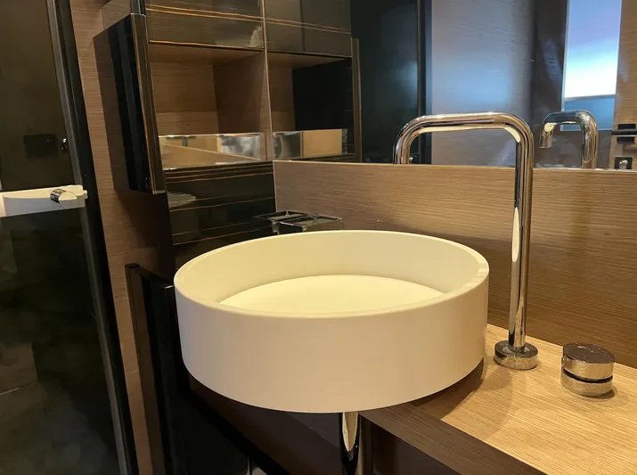  Yacht Photos Pics Modern bathroom sink on 2018 Ferretti Yachts 780, featuring sleek design and chrome fixtures.