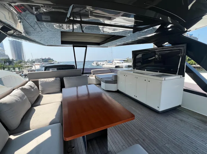  Yacht Photos Pics Luxurious 2018 Ferretti Yachts 780 deck with seating, table, and ocean view.