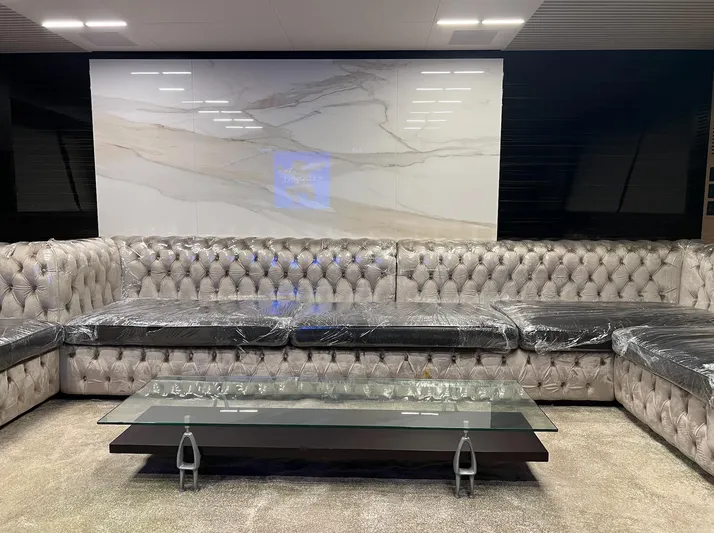  Yacht Photos Pics Luxurious interior of 2018 Ferretti Yachts 780 with plush seating and glass table.