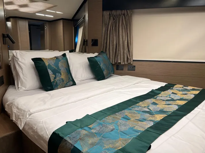  Yacht Photos Pics Luxurious bedroom interior on 2018 Ferretti Yachts 780, featuring elegant bedding and decor.