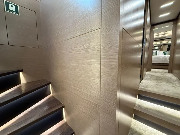  Yacht Photos Pics Luxurious interior of 2018 Ferretti Yachts 780, featuring elegant wood paneling and modern design.