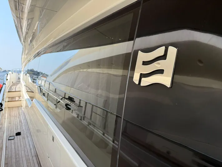  Yacht Photos Pics 2018 Ferretti Yachts 780 side view with logo, showcasing sleek design and luxury.