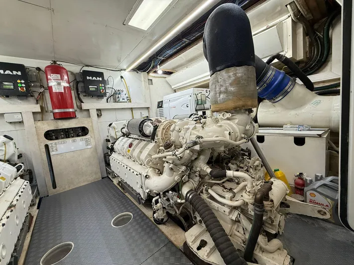  Yacht Photos Pics Engine room of 2018 Ferretti Yachts 780, featuring MAN engines and safety equipment.