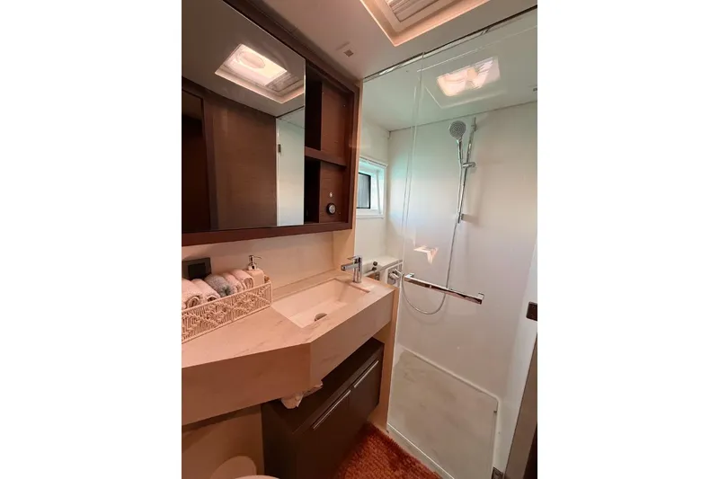  Yacht Photos Pics Modern bathroom in 2020 Lagoon 46 yacht with shower and sleek vanity.