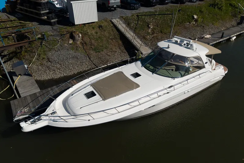  Yacht Photos Pics 2004 Sea Ray Sundancer 460 yacht docked at marina, aerial view.