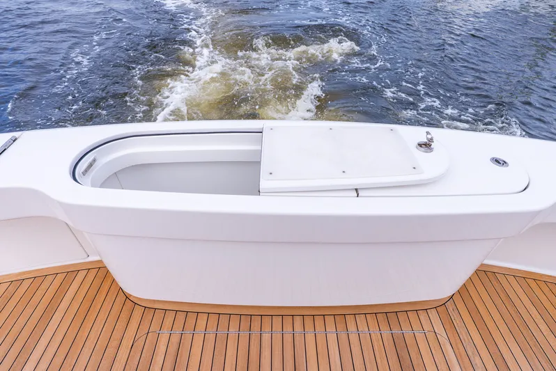 Unbridled Yacht Photos Pics Aft view of 2019 Viking 68 Enclosed Bridge yacht.