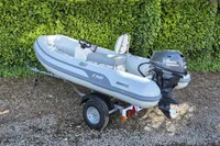 2021 AB Inflatables Lammina 10 AL boat with Yamaha motor on trailer.