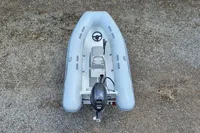 2021 AB Inflatables Lammina 10 AL boat on gravel surface, top view.