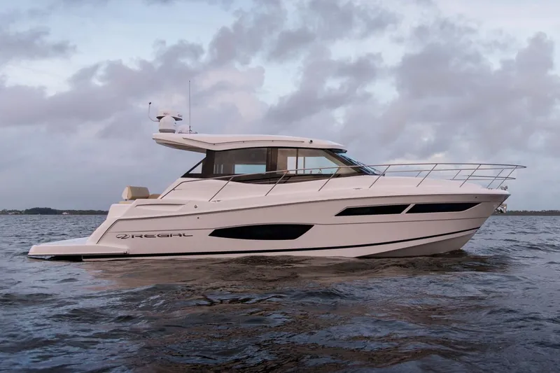  Yacht Photos Pics Manufacturer Provided Image: 2020 Regal 38 Grande Coupe luxury yacht on open water.
