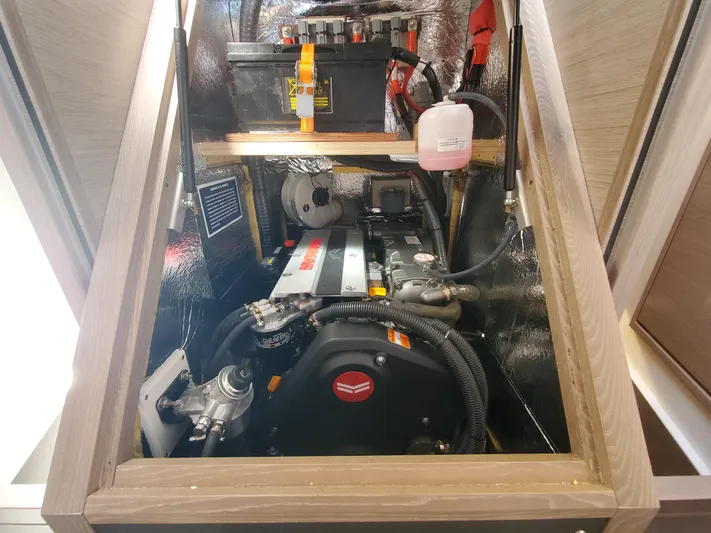 Navigamus Yacht Photos Pics Engine compartment of 2023 Hanse 460 yacht, showcasing mechanical components and storage.