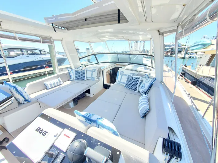 Navigamus Yacht Photos Pics Luxurious 2023 Hanse 460 yacht interior with spacious seating and elegant design.