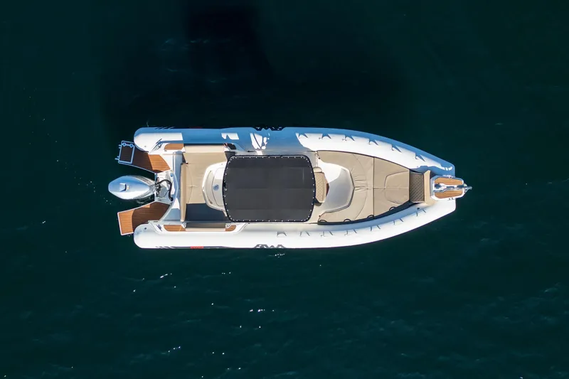  Yacht Photos Pics Aerial view of 2026 BWA GTO 308 boat on dark water.