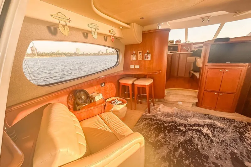  Yacht Photos Pics Luxurious interior of a 2003 Silverton 410 Sport Bridge yacht with waterfront view.