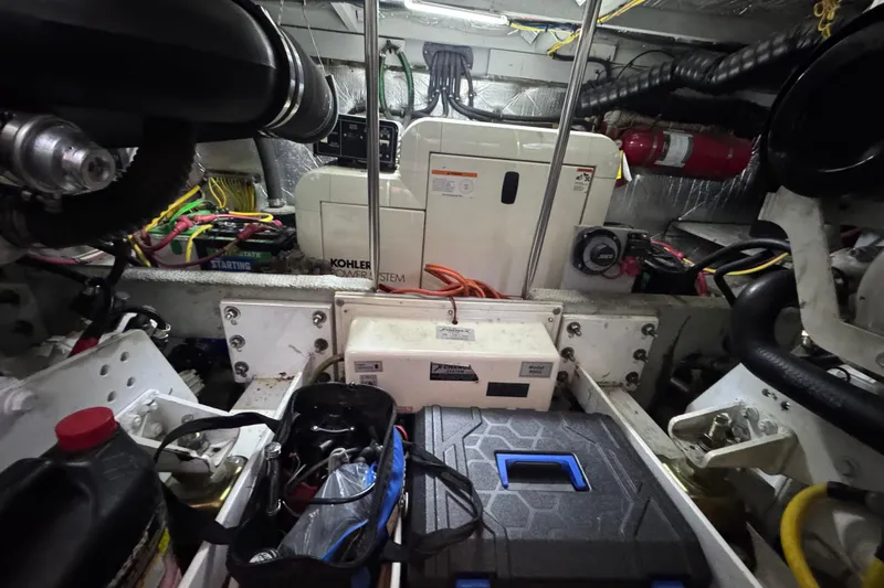  Yacht Photos Pics Engine room of 2003 Silverton 410 Sport Bridge with Kohler power system and equipment.