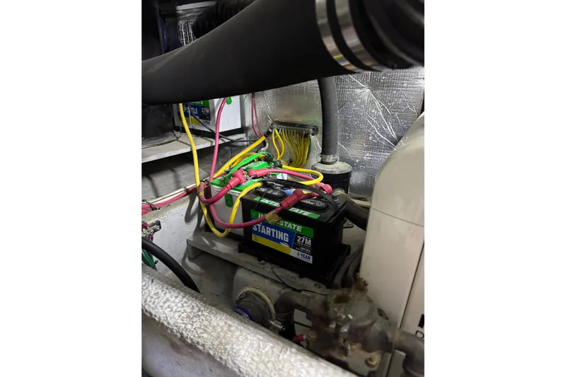  Yacht Photos Pics Engine compartment of a 2003 Silverton 410 Sport Bridge with battery and wiring.