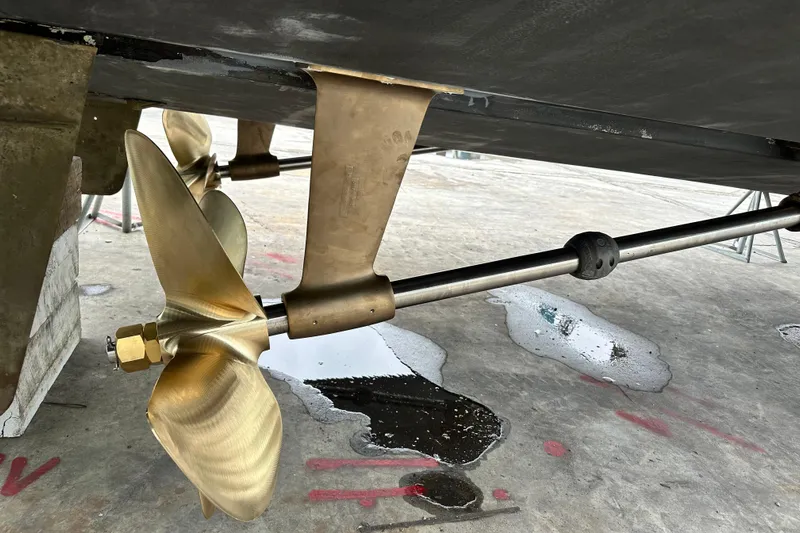  Yacht Photos Pics Propeller and shaft of a 2003 Silverton 410 Sport Bridge boat on dry dock.