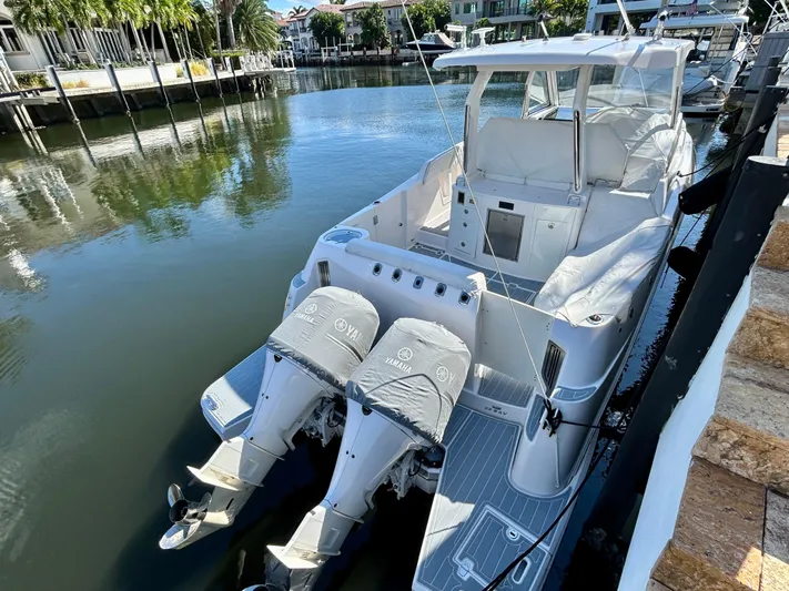 All Gas No Brakes Yacht Photos Pics 2020 Regal 33 SAV boat docked with twin Yamaha outboard engines.