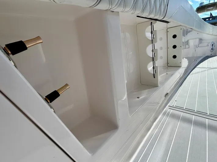All Gas No Brakes Yacht Photos Pics 2020 Regal 33 SAV boat interior detail with storage compartments.