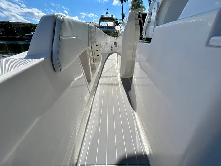 All Gas No Brakes Yacht Photos Pics 2020 Regal 33 SAV boat deck with sleek white design and clear blue sky.