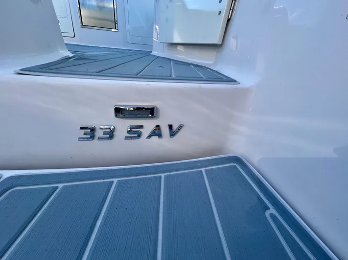 All Gas No Brakes Yacht Photos Pics 2020 Regal 33 SAV boat interior with sleek design and modern flooring.
