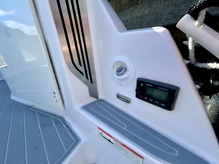 All Gas No Brakes Yacht Photos Pics 2020 Regal 33 SAV boat interior with control panel and sleek design.