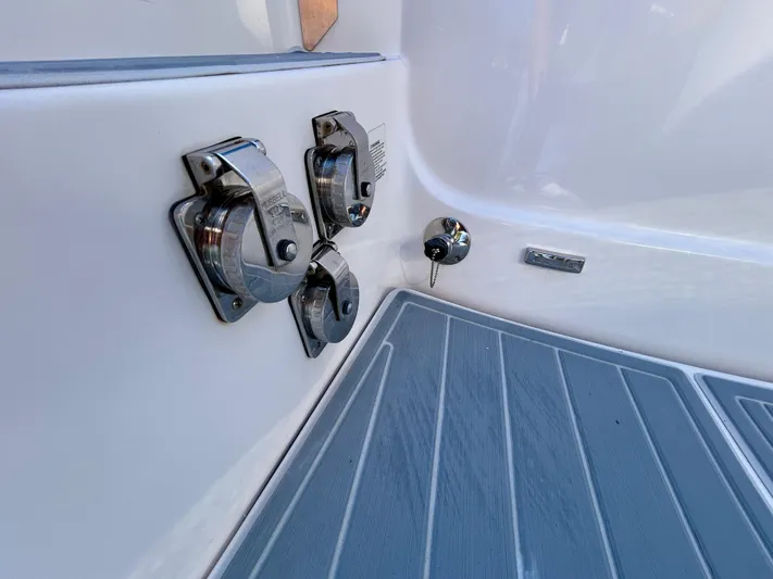 All Gas No Brakes Yacht Photos Pics 2020 Regal 33 SAV boat deck with stainless steel fixtures.