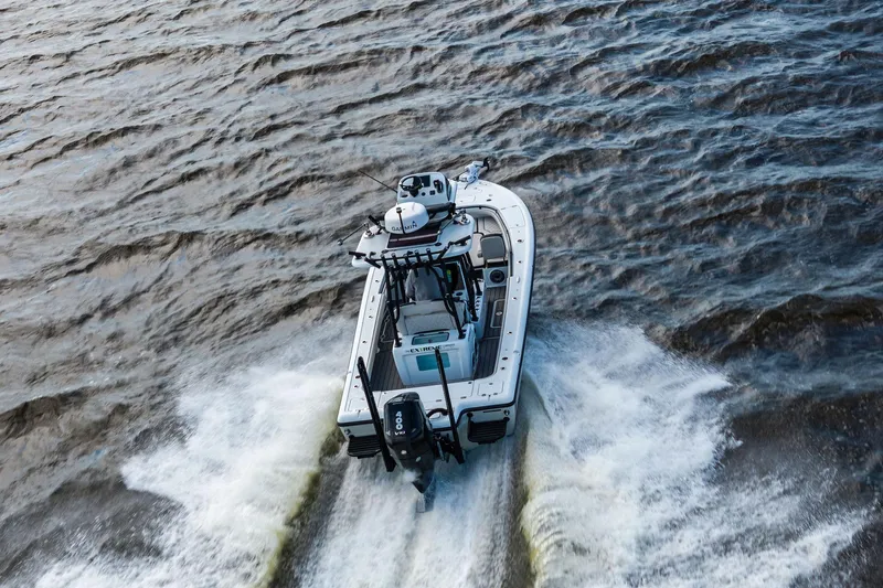  Yacht Photos Pics 2021 Barker Boatworks 26 Open cruising on choppy waters, rear view.