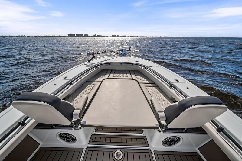  Yacht Photos Pics 2021 Barker Boatworks 26 Open on water, showcasing spacious deck and seating.