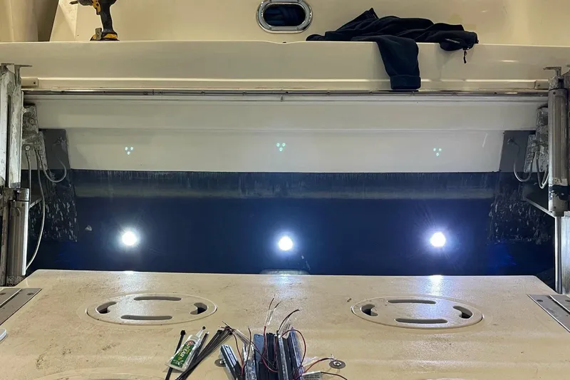  Yacht Photos Pics 1997 Sea Ray Sundancer 400 boat interior with lights and tools visible.