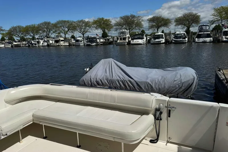  Yacht Photos Pics 1997 Sea Ray Sundancer 400 yacht docked at marina with covered boat nearby.
