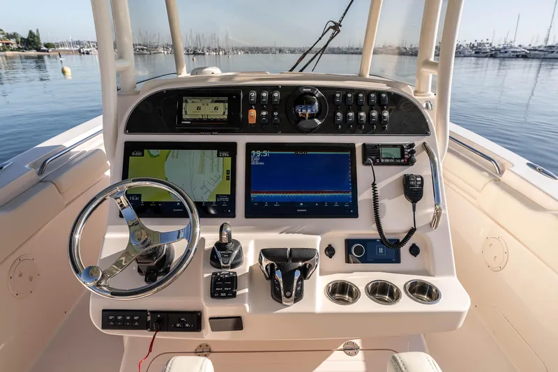  Yacht Photos Pics 2022 Grady-White Canyon 306 helm with advanced navigation and control systems.