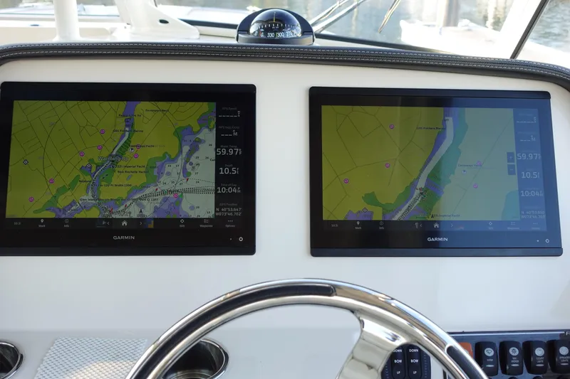  Yacht Photos Pics Dual Garmin displays on 2021 Grady-White Freedom 325 boat dashboard.
