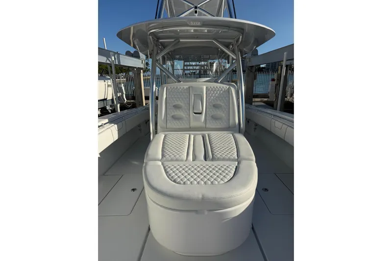 Scott Free Yacht Photos Pics 2024 Contender 44 ST boat with luxurious seating and sleek design.