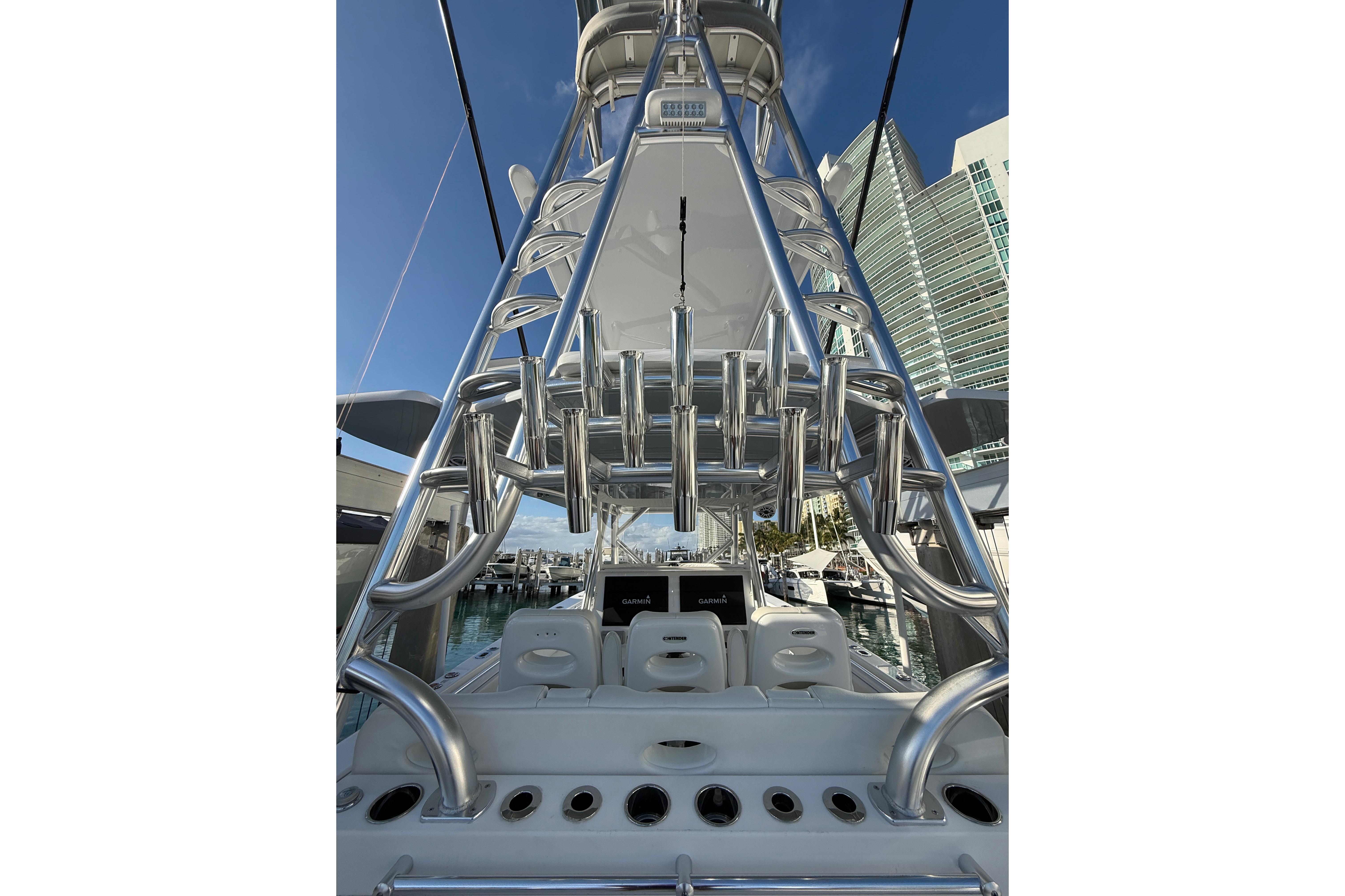 2024 Contender 44 ST boat with sleek metal framework and modern design.