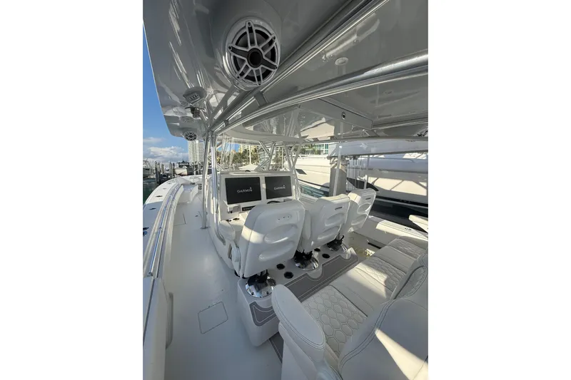 Scott Free Yacht Photos Pics 2024 Contender 44 ST boat interior with advanced Garmin navigation systems.