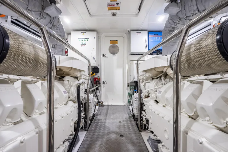 Omnia Yacht Photos Pics Engine room of 2018 Pearl 80 yacht, featuring dual engines and control systems.