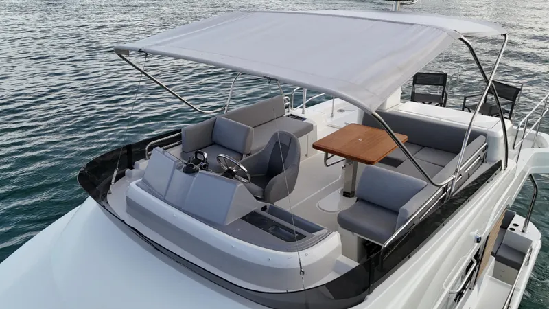 Sarandipity Yacht Photos Pics 2024 Beneteau Swift Trawler 41 Fly, featuring spacious flybridge seating and canopy.