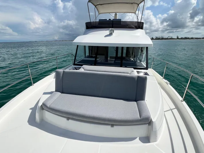 Sarandipity Yacht Photos Pics 2024 Beneteau Swift Trawler 41 Fly on open water, featuring spacious deck seating.