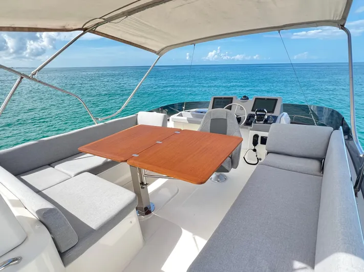 Sarandipity Yacht Photos Pics 2024 Beneteau Swift Trawler 41 Fly, spacious deck with seating, ocean view.