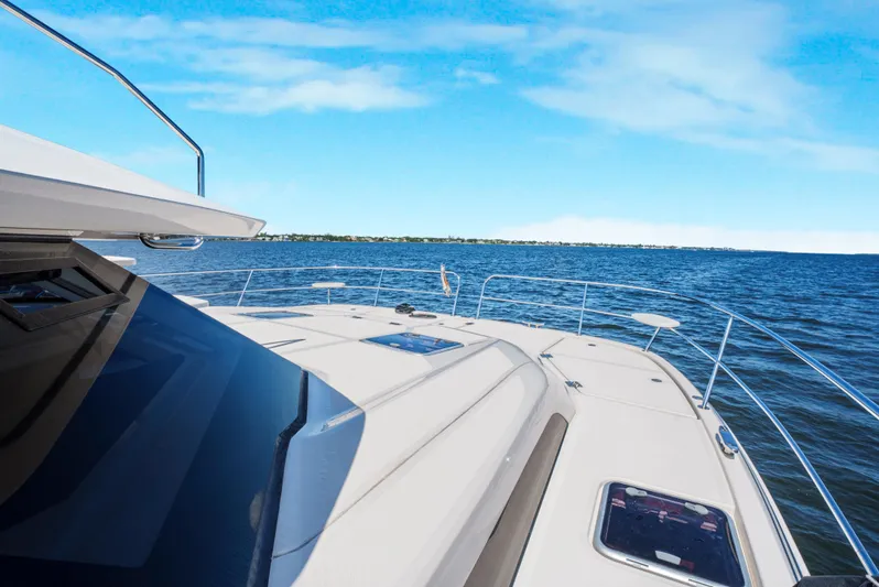 Ryan's Inheritance Yacht Photos Pics Aquila 44 Yacht 2017 cruising on open water under clear blue skies.