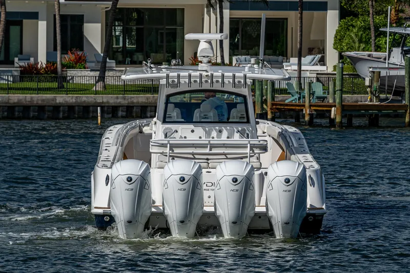  Yacht Photos Pics 2020 HCB 53 boat with four powerful outboard engines on the water.