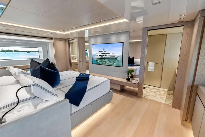 Glory Yacht Photos Pics Luxurious interior of 2023 Sanlorenzo SD126 yacht with modern bedroom and large window view.