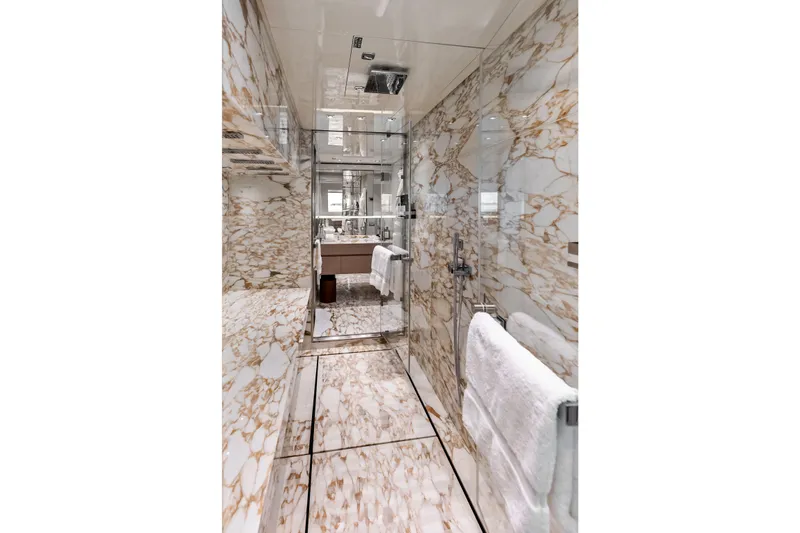 Glory Yacht Photos Pics Luxurious marble bathroom in 2023 Sanlorenzo SD126 yacht, featuring elegant fixtures and modern design.