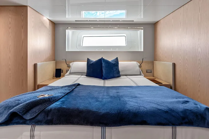 Glory Yacht Photos Pics Luxurious bedroom interior on 2023 Sanlorenzo SD126 yacht, featuring elegant bedding and modern design.